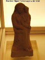 Santuario ibrico del Collado de los Jardines. Figura femenina de arcilla con nio en brazos. Siglo IV a.C. - I d.C. Museo Provincial de Jan