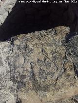 Pozo de Mara Martn. Piedra con marcas de afilar