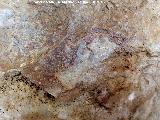 Pinturas y petroglifos rupestres de la Cueva del Encajero. Figura indeterminada