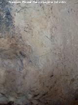 Pinturas y petroglifos rupestres de la Cueva del Encajero. Uno de los paneles de petroglifos