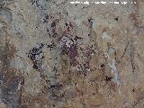 Pinturas rupestres del Abrigo del Puerto. Manchas centrales de la parte superior