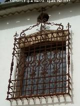 Casa de la Calle Valencia n 29. Reja de rosetas con cruz de Santiago