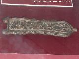 Historia de Santo Tom. Broche de placa liriforme de bronce, siglos VI-VII. Museo Provincial de Jan