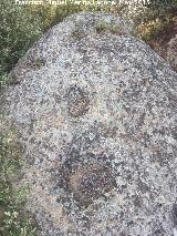 Petroglifos rupestres de la Piedra Hueca Chica. Cazoletas