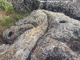 Petroglifos rupestres de la Piedra Hueca Grande. Canal de desage