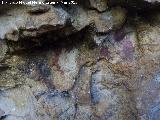 Pinturas rupestres de la Cueva de los Herreros Grupo VIII. Figura vertical y tres digitaciones