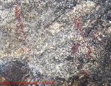 Pinturas rupestres de la Cueva de los Herreros Grupo IV. Barra y restos de figura