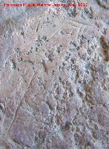 Pinturas y petroglifos rupestres del Abrigo de los cortados del Canjorro. Grabados