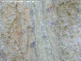 Pinturas rupestres del Abrigo del Ventorrillo. Restos de pinturas tapados por incrustaciones calcreas