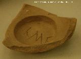 Ciudad iberorromana de Isturgi. Fragmento de molde con las letras LMF SS I-II dC. Museo Arqueológico Provincial