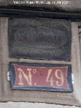 Casa de la Calle Real n 49. Antigua placa de seguros y nmero
