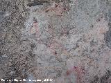 Pinturas rupestres de la Cueva Secreta Grupo II. Restos de pintura sobre el antropomorfo inferior