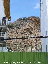 Muralla de Alcaudete. Torren tras las casas de la Calle Carnicera