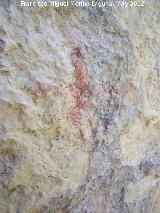 Pinturas rupestres de la Caada de la Corcuela. Antropomorfo en cruz de la derecha