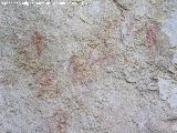 Pinturas rupestres de la Caada de la Corcuela. Antropomorfos bajos capturando a las cabras