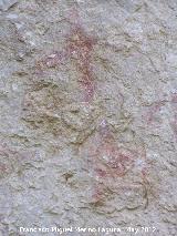 Pinturas rupestres de la Caada de la Corcuela. Antropomorfo bajo izquierdo capturando a las cabras