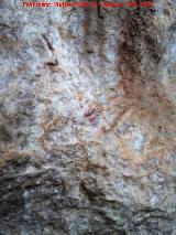 Pinturas rupestres de la Cueva de Limones. Mancha de color rojo