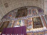 Iglesia de la Inmaculada. Parte alta del retablo con el cuadro de La Huida en primer lugar, la Inmaculada en el centro, los Evangelistas y la Crucifixin en la parte alta