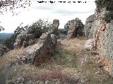 Oppidum ibero de Plaza de Armas. Estratos rocosos utilizados como muros