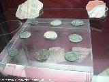 Fbrica de salazn fenicia El Majuelo. Monedas pnicas de Sexi y estucos con frescos. Museo Arqueolgico de Almucar